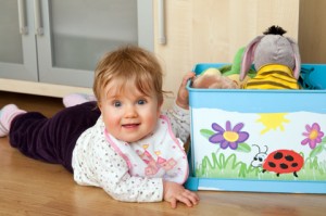 child with toy box